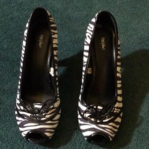 Zebra print pumps